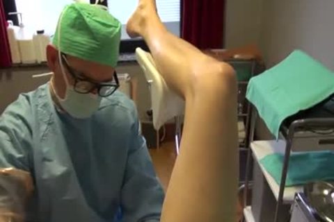 25yo Male Patient receives Fisting Initiation By Surgeon On The Examination Table.