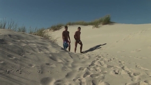 Tanned men slamming On The Beach