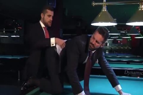 Two guys In Suits Meet In A Bar