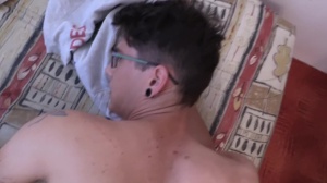 A horny lad takes his clothes off