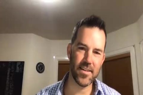 older man stroking On webcam