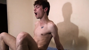 LatinLeche.com: Student Esteban licking uncut cock in the bed