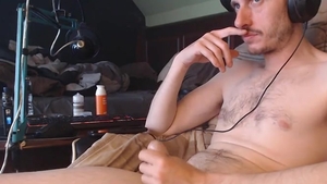 Skinny chap Masturbates Listening To Music