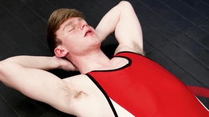 Varsity Grip: Eric Charming beside Brian Bonds wrestling