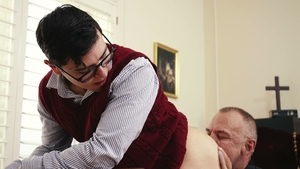 Priest kisses neck while unbuttoning pants